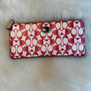 Women’s Coach Pink Signature Wallet with zipper closure. Like new